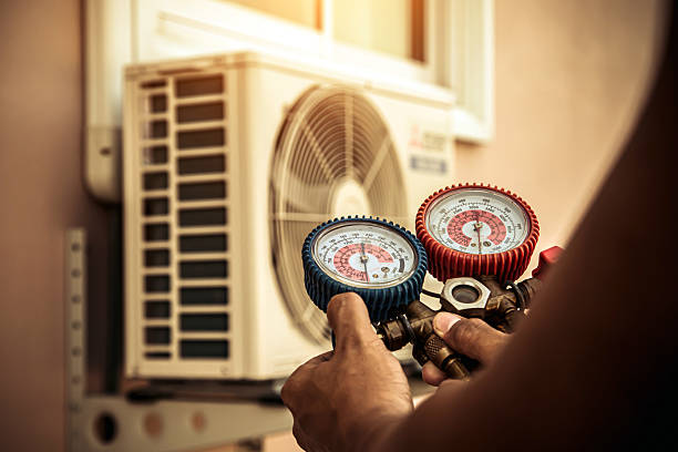 Professional Air Conditioning Service technician working in Bardwell, KY